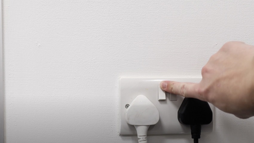 Turn off power at wall to the fridge freezer